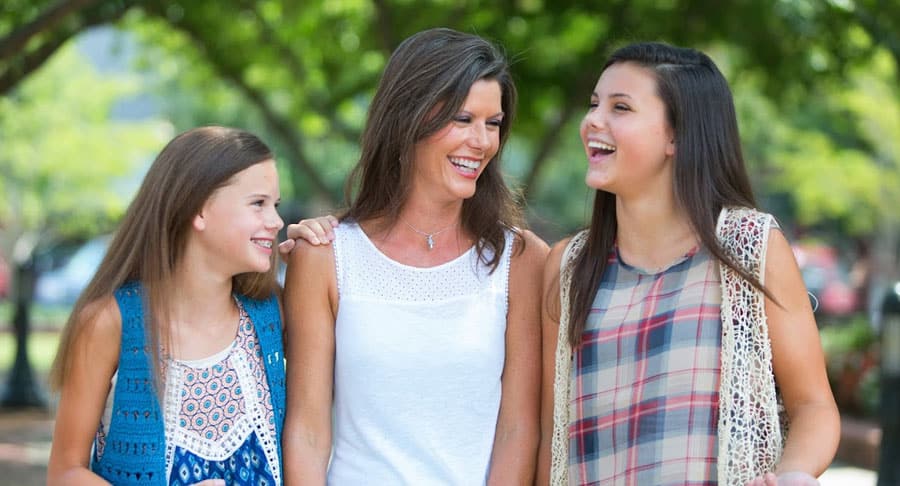 Family smiling Figueroa Orthodontics in Naperville and Winnetka, IL